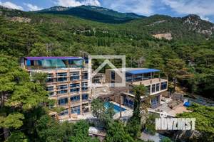 Дом 1480м², 4-этажный, участок 25 сот.