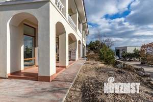 Коттедж 281м², 3-этажный, участок 5 сот.