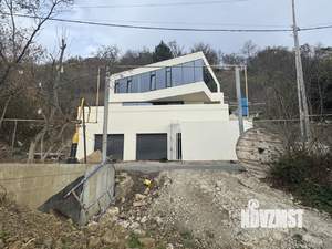 Коттедж 545м², 3-этажный, участок 10 сот.  