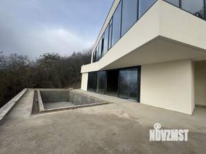 Коттедж 545м², 3-этажный, участок 10 сот.  